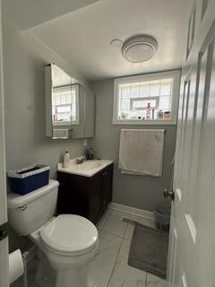 1236 Fisher Street Munster, IN 46321 - Photo 16 of 29 a bathroom with a sink toilet and shower