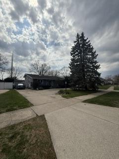 1236 Fisher Street Munster, IN 46321 - Photo 2 of 29 a view of yard with swimming pool and green space