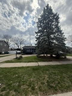 1236 Fisher Street Munster, IN 46321 - Photo 4 of 29 a view of a fountain in front of a house