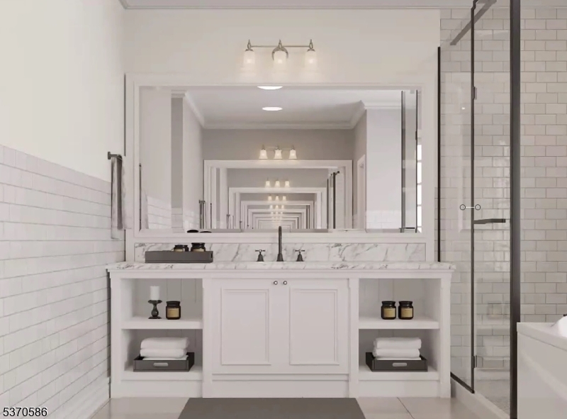 342 Ridge Road Dayton, NJ 08810 - Photo 16 of 46 a bathroom with a sink a vanity and a mirror