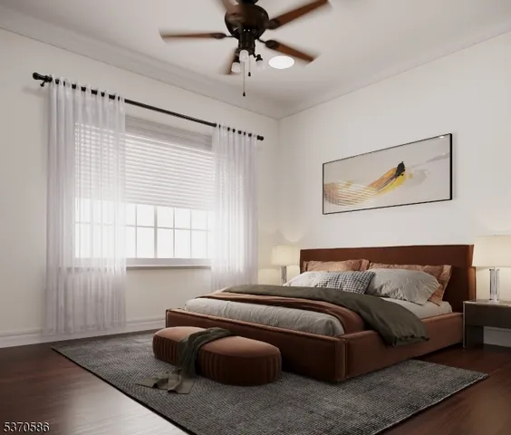 a kitchen with stainless steel appliances granite countertop a refrigerator a sink dishwasher a stove and white countertops with wooden floor