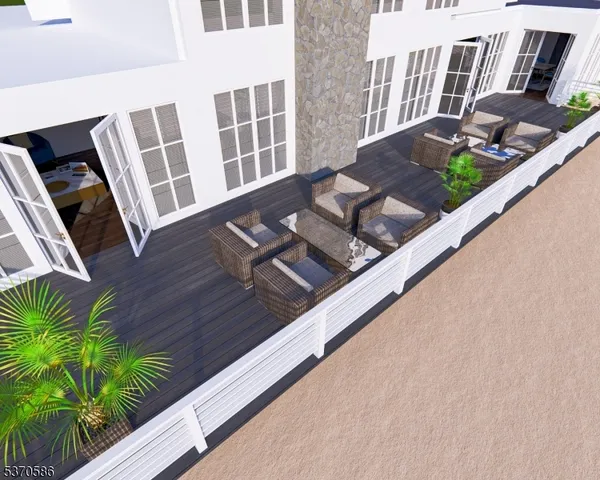 a bathroom with a granite countertop shower a sink and a mirror