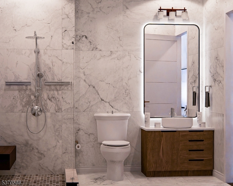 342 Ridge Road Dayton, NJ 08810 - Photo 31 of 46 a bathroom with a granite countertop toilet a sink and a mirror