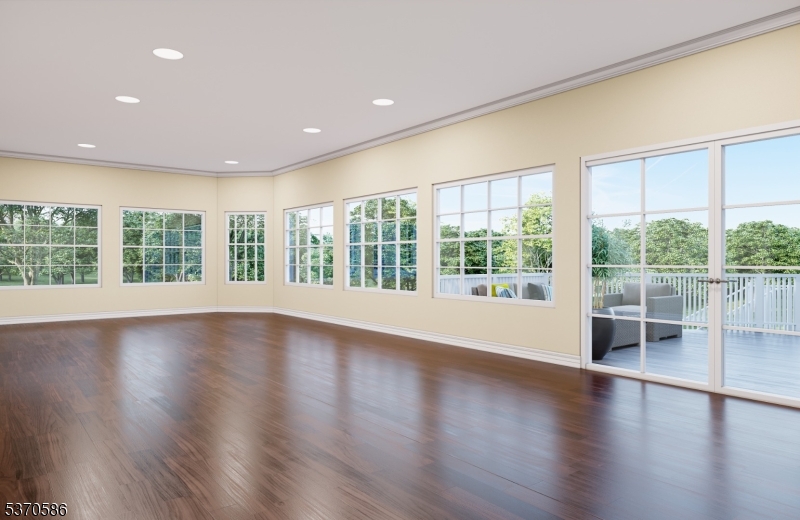 342 Ridge Road Dayton, NJ 08810 - Photo 9 of 46 a view of empty room with wooden floor and fan