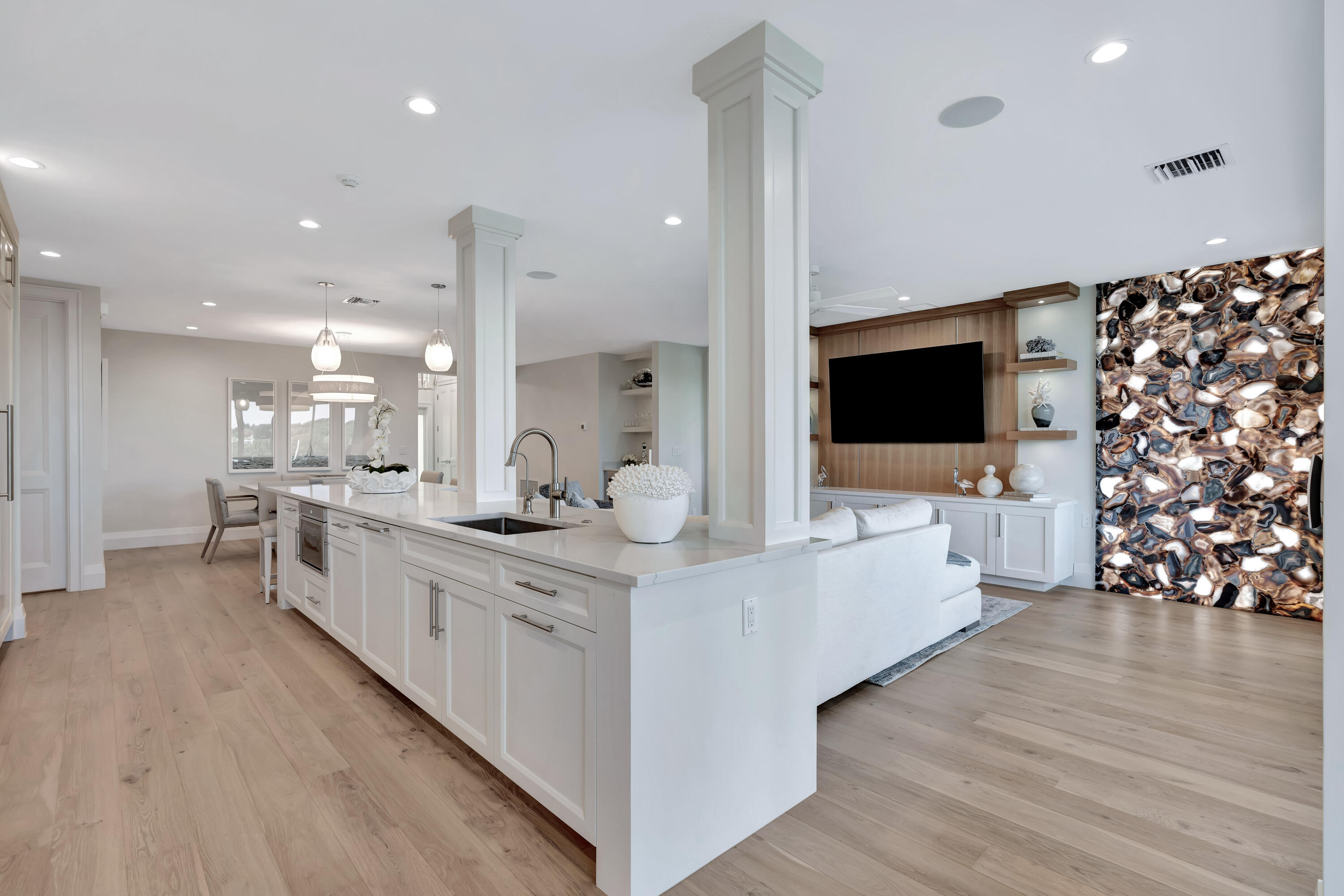 260 Eagle Drive Jupiter, FL 33477 - Photo 13 of 41 a large white kitchen with a large counter top appliances and cabinets