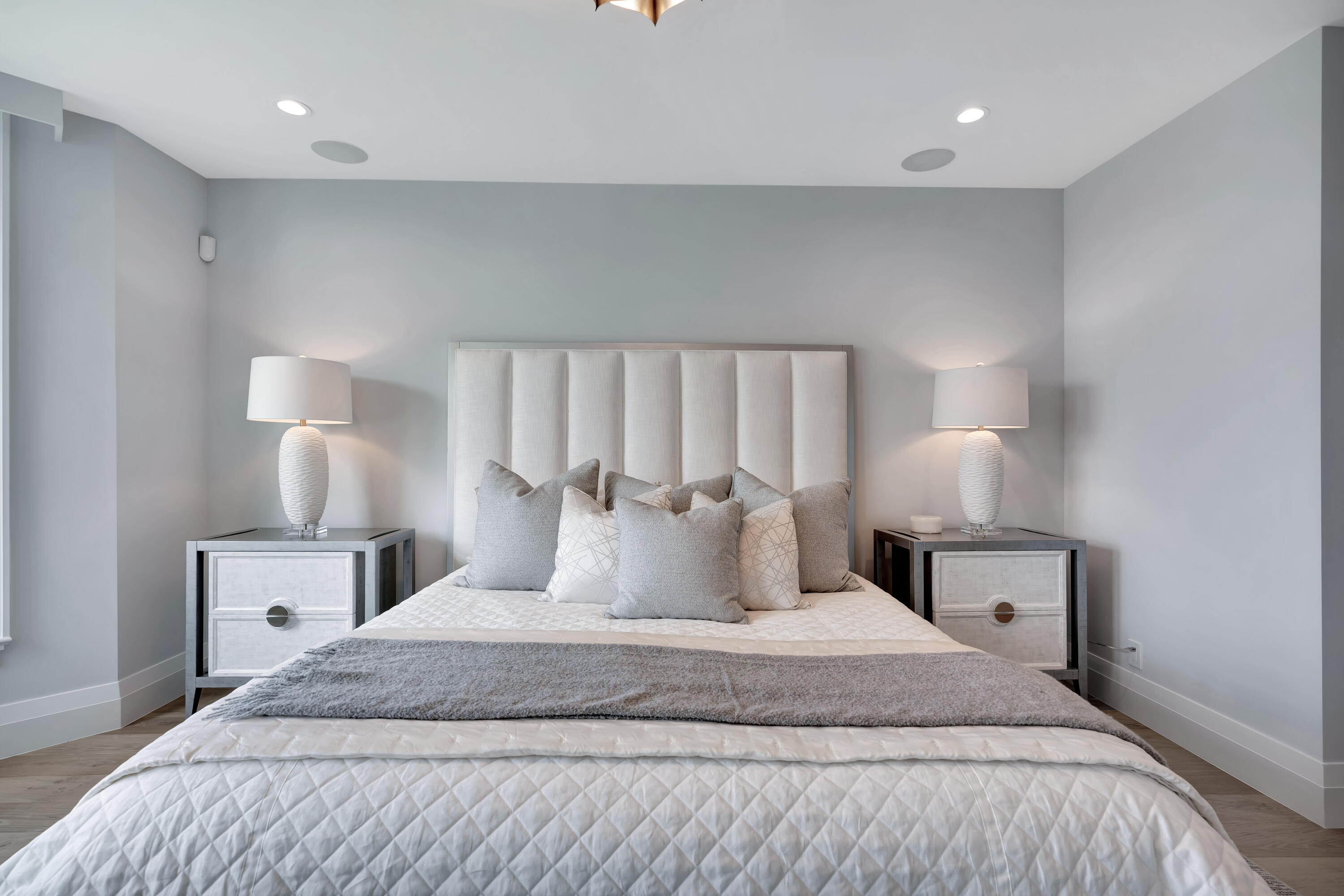 260 Eagle Drive Jupiter, FL 33477 - Photo 23 of 41 a bedroom with a bed and a night stand