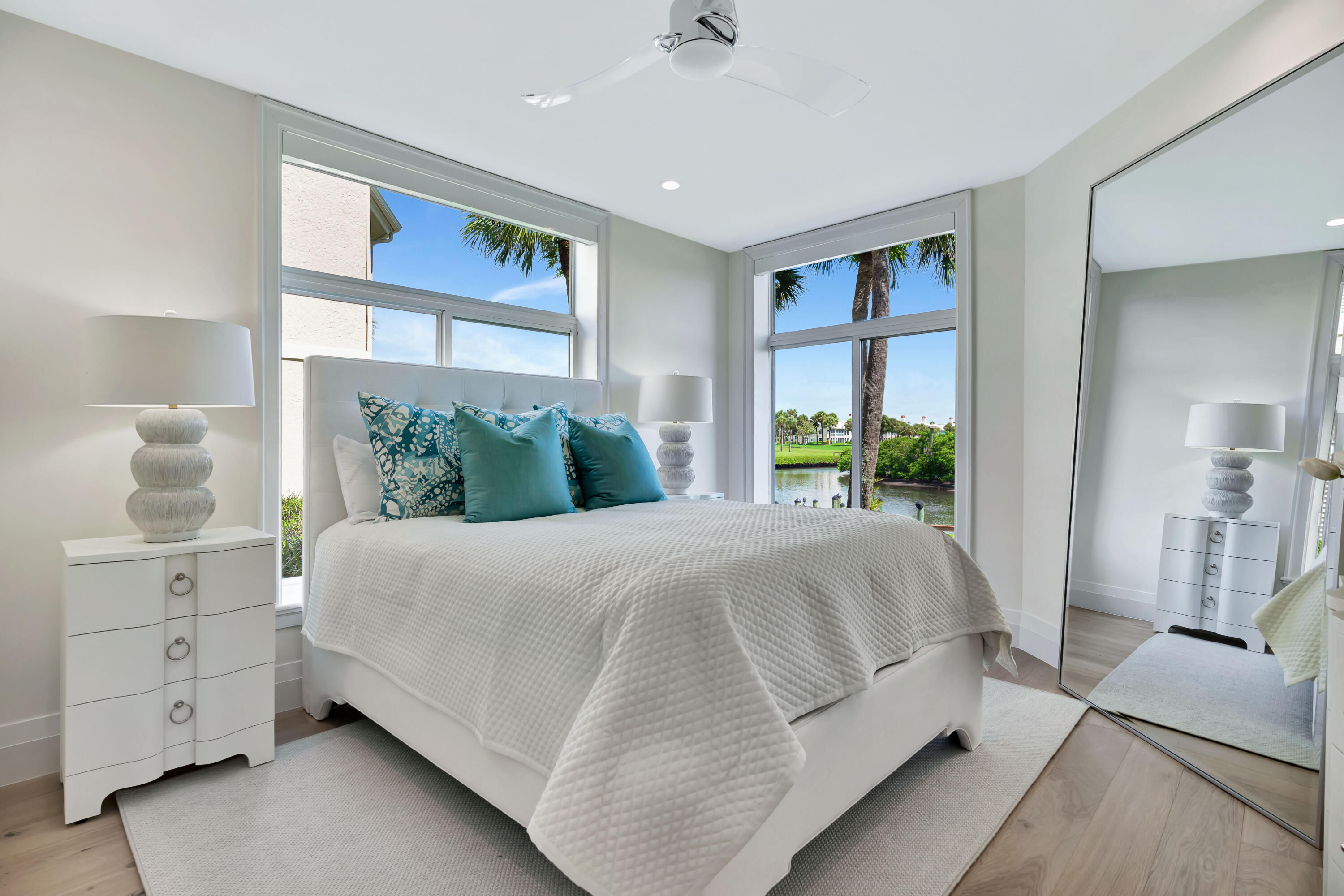 260 Eagle Drive Jupiter, FL 33477 - Photo 28 of 41 a bedroom with a large bed and a window