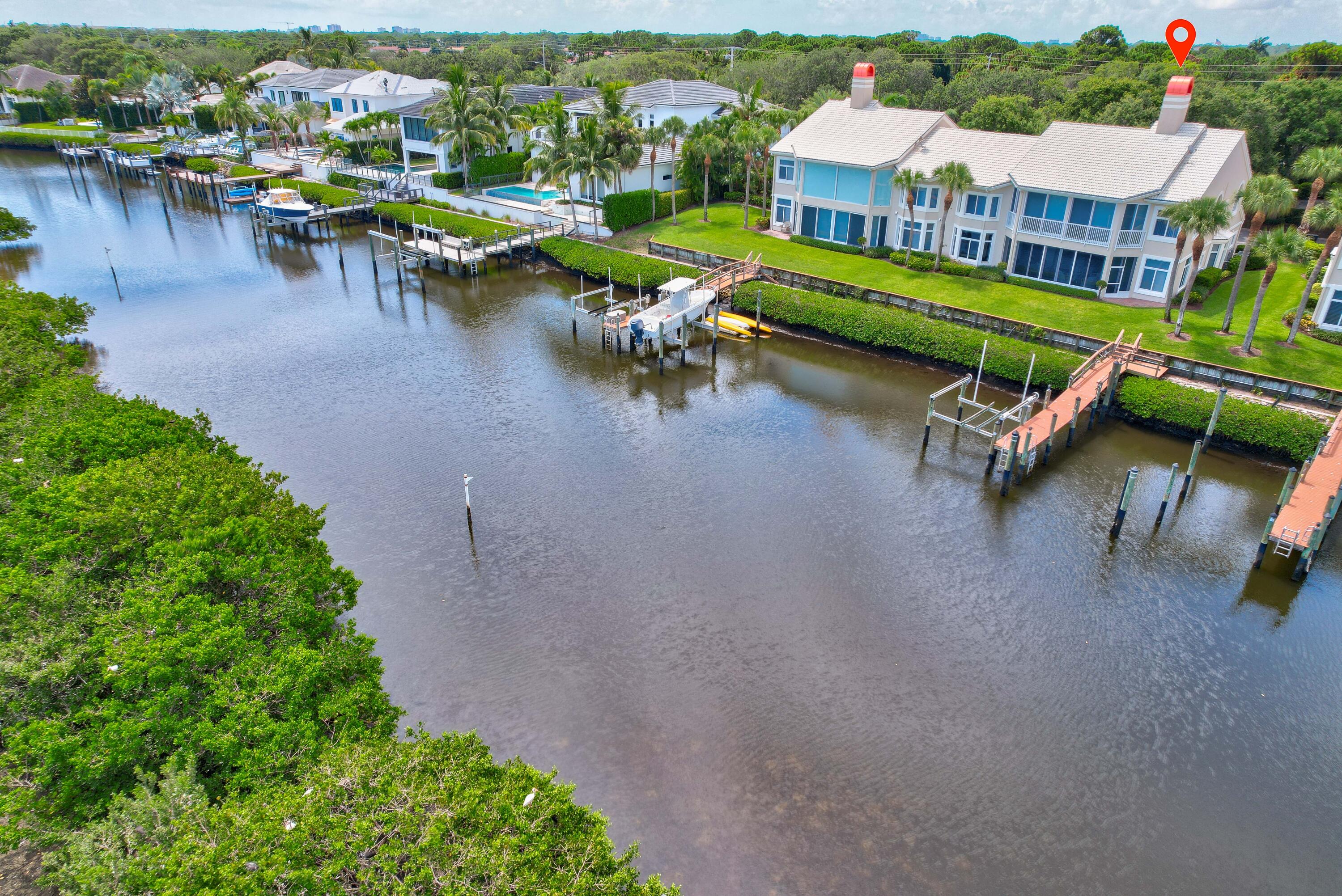 260 Eagle Drive Jupiter, FL 33477 - Photo 33 of 41 an aerial view of a house with outdoor seating lake view