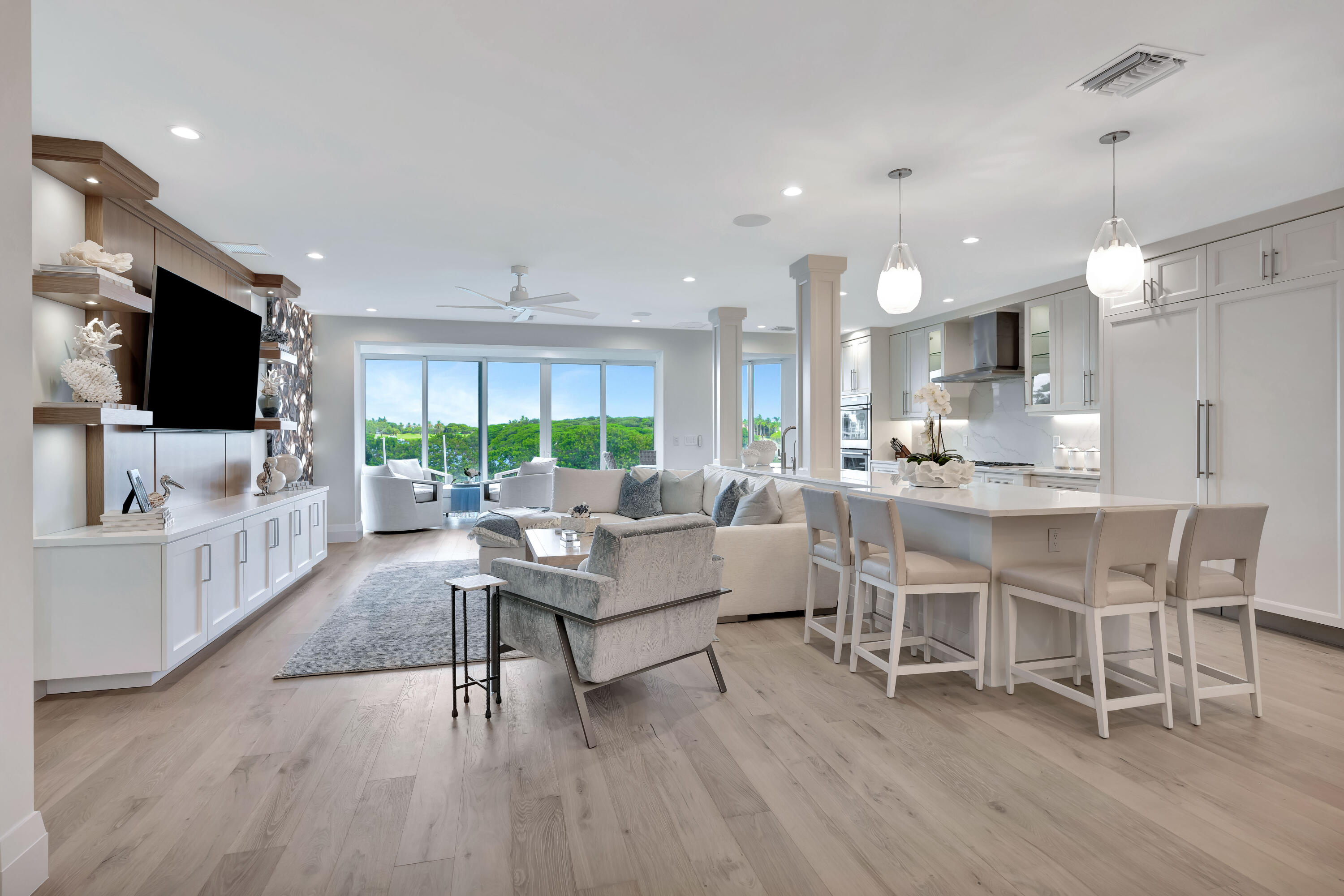 260 Eagle Drive Jupiter, FL 33477 - Photo 40 of 41 a living room with fireplace furniture and a flat screen tv