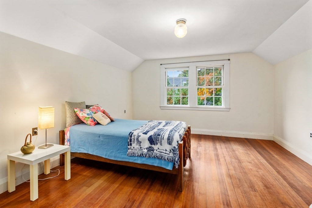 17 Berwick Road Newton, MA 02459 - Photo 25 of 35 a bedroom with a bed and a wooden floor