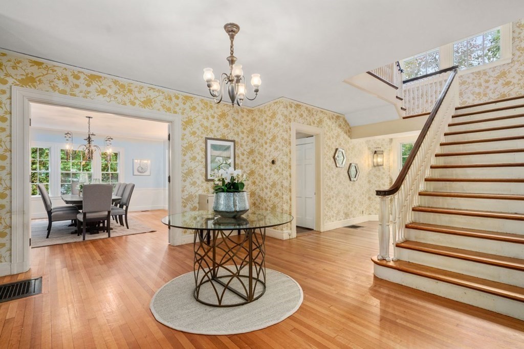 17 Berwick Road Newton, MA 02459 - Photo 6 of 35 a view of a dining room with furniture wooden floor and chandelier