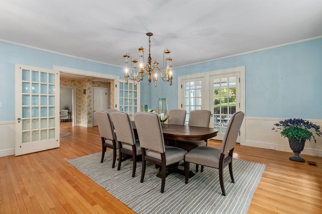 17 Berwick Road Newton, MA 02459 - Photo 8 of 35 a view of a dining room with furniture and wooden floor