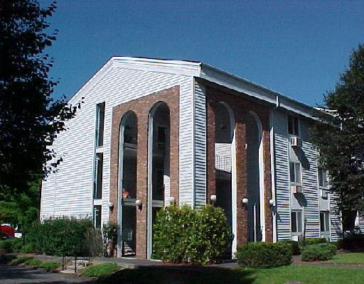 81 Coalpit Hill Road, Unit F Danbury, CT 06810 - Photo 1 of 1 a view of a house with a yard