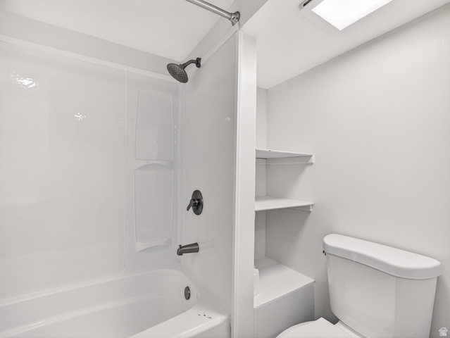 74 South 300 East Springville, UT 84663 - Photo 25 of 48 Bathroom featuring a white tub and shower combination with a dark-finished shower head and faucet