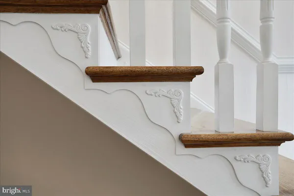 a bathroom with a sink mirror and vanity