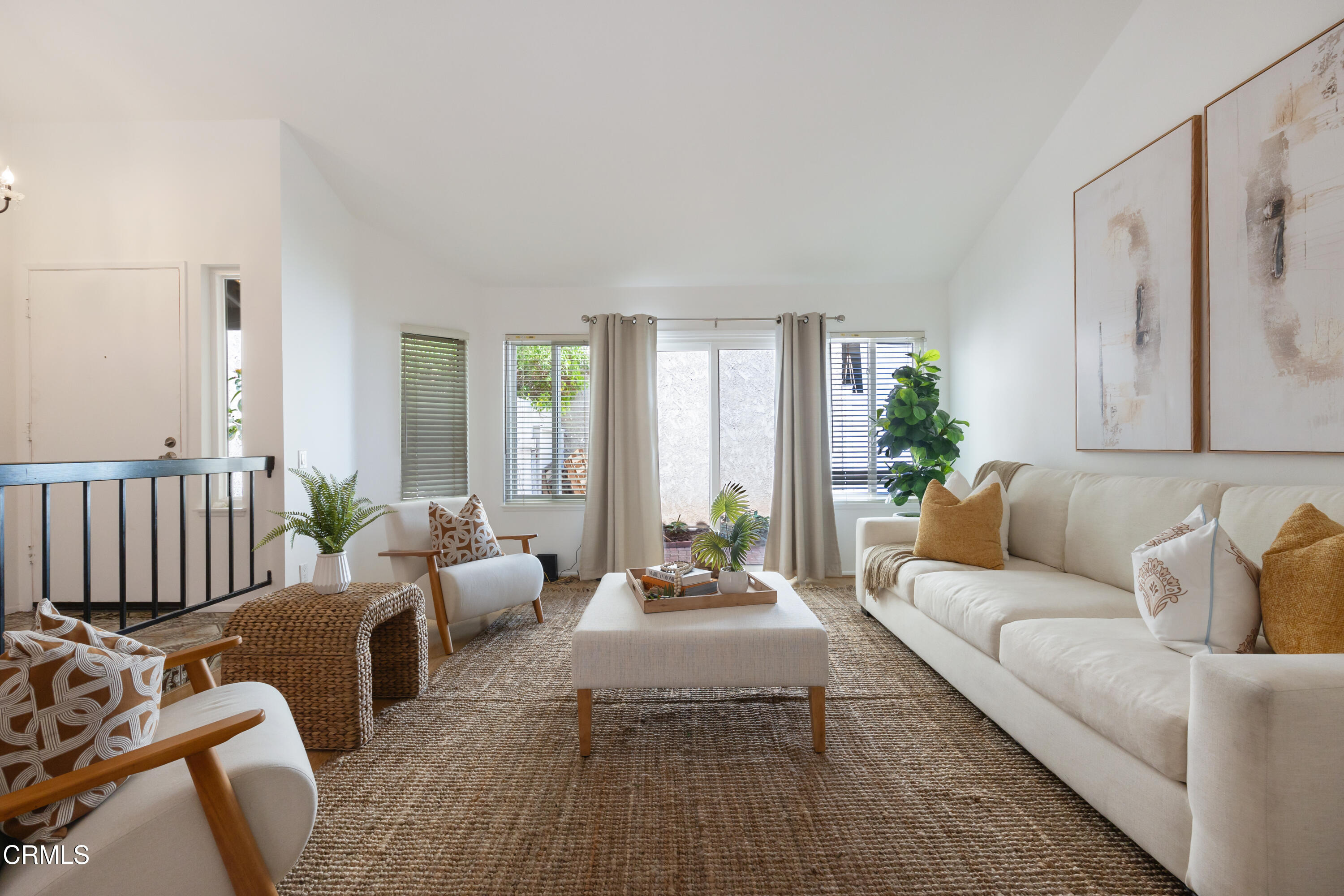 6464 Melray Street Moorpark, CA 93021 - Photo 11 of 57 a living room with furniture wooden floor and a large window