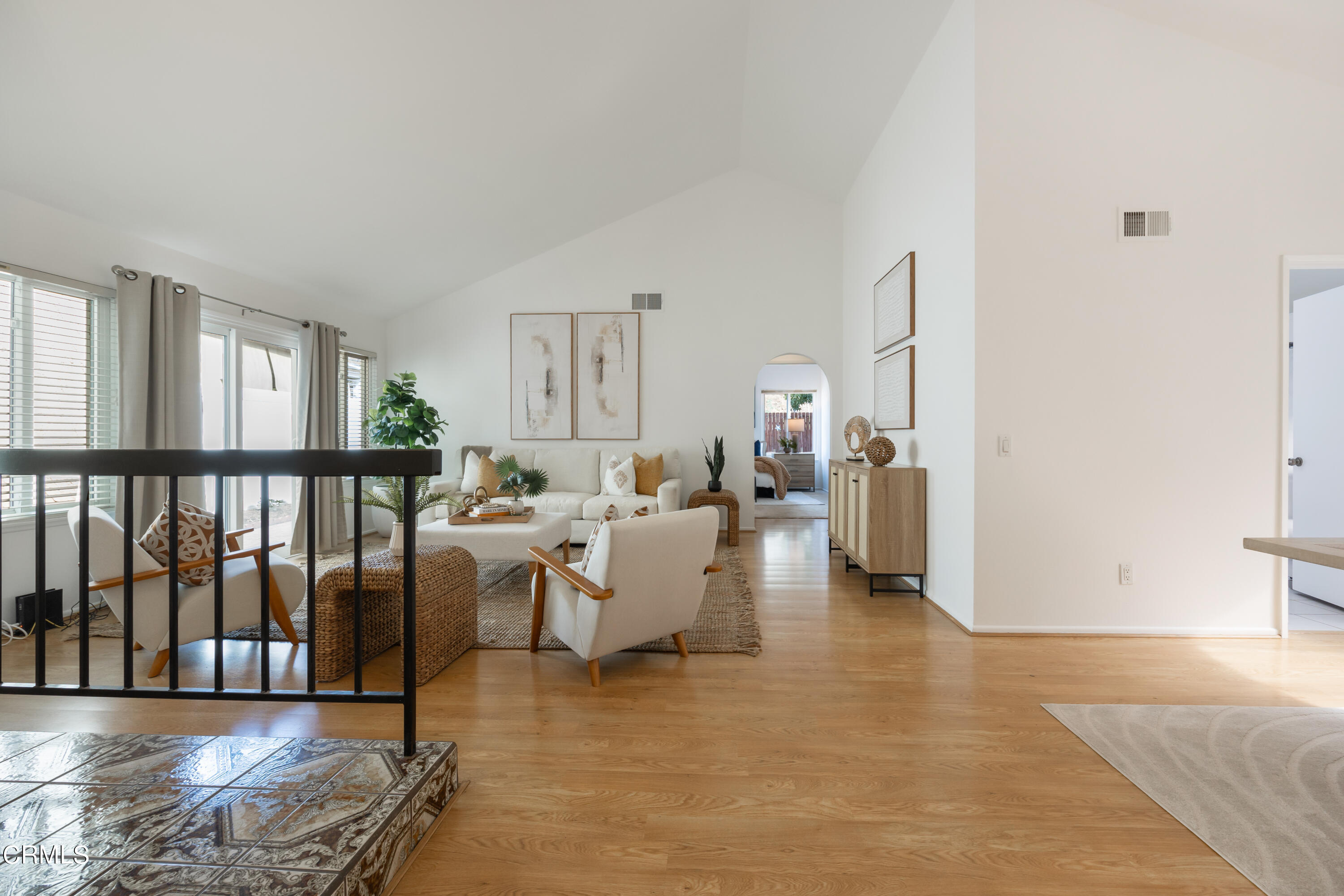 6464 Melray Street Moorpark, CA 93021 - Photo 18 of 57 a living room with couches and a coffee table with wooden floor