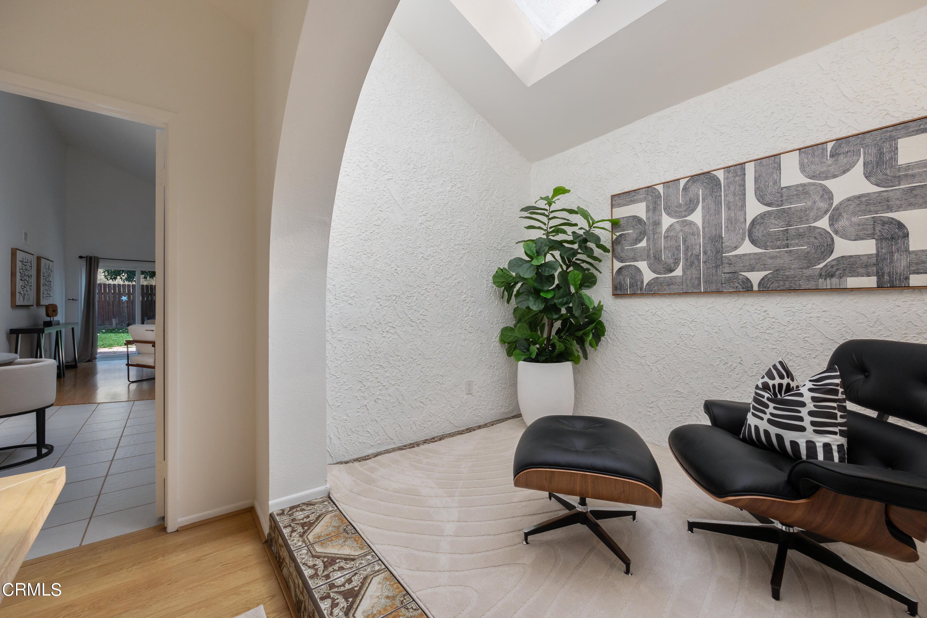 6464 Melray Street Moorpark, CA 93021 - Photo 20 of 57 a workspace with furniture and a potted plant