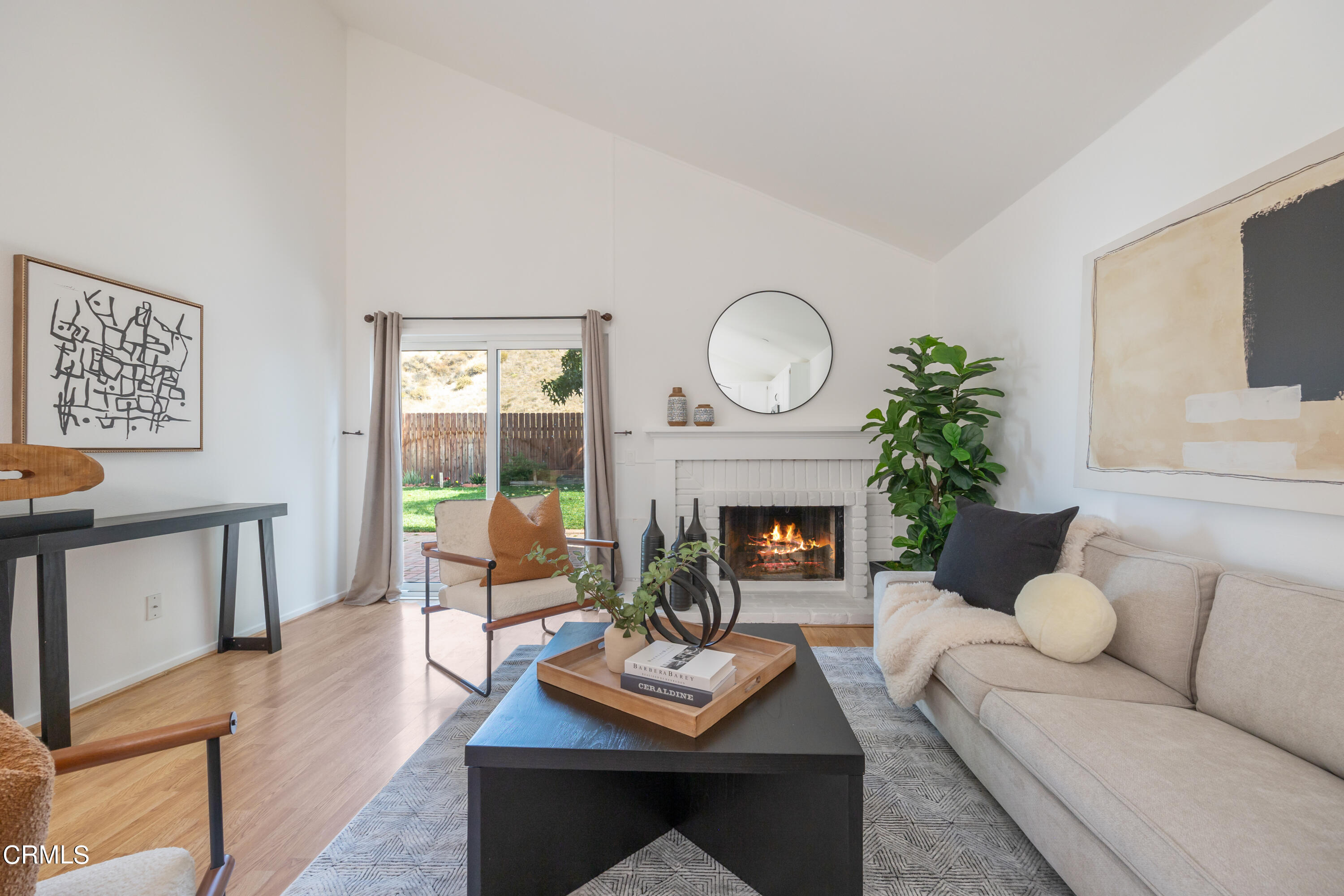 6464 Melray Street Moorpark, CA 93021 - Photo 31 of 57 a living room with furniture and a fireplace