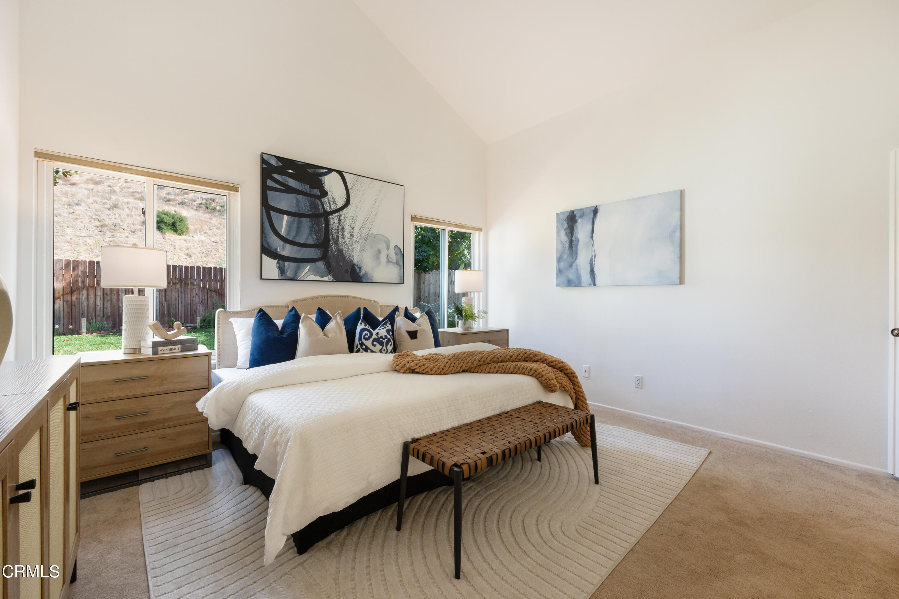 6464 Melray Street Moorpark, CA 93021 - Photo 37 of 57 a bedroom with a large bed and a painting on the wall