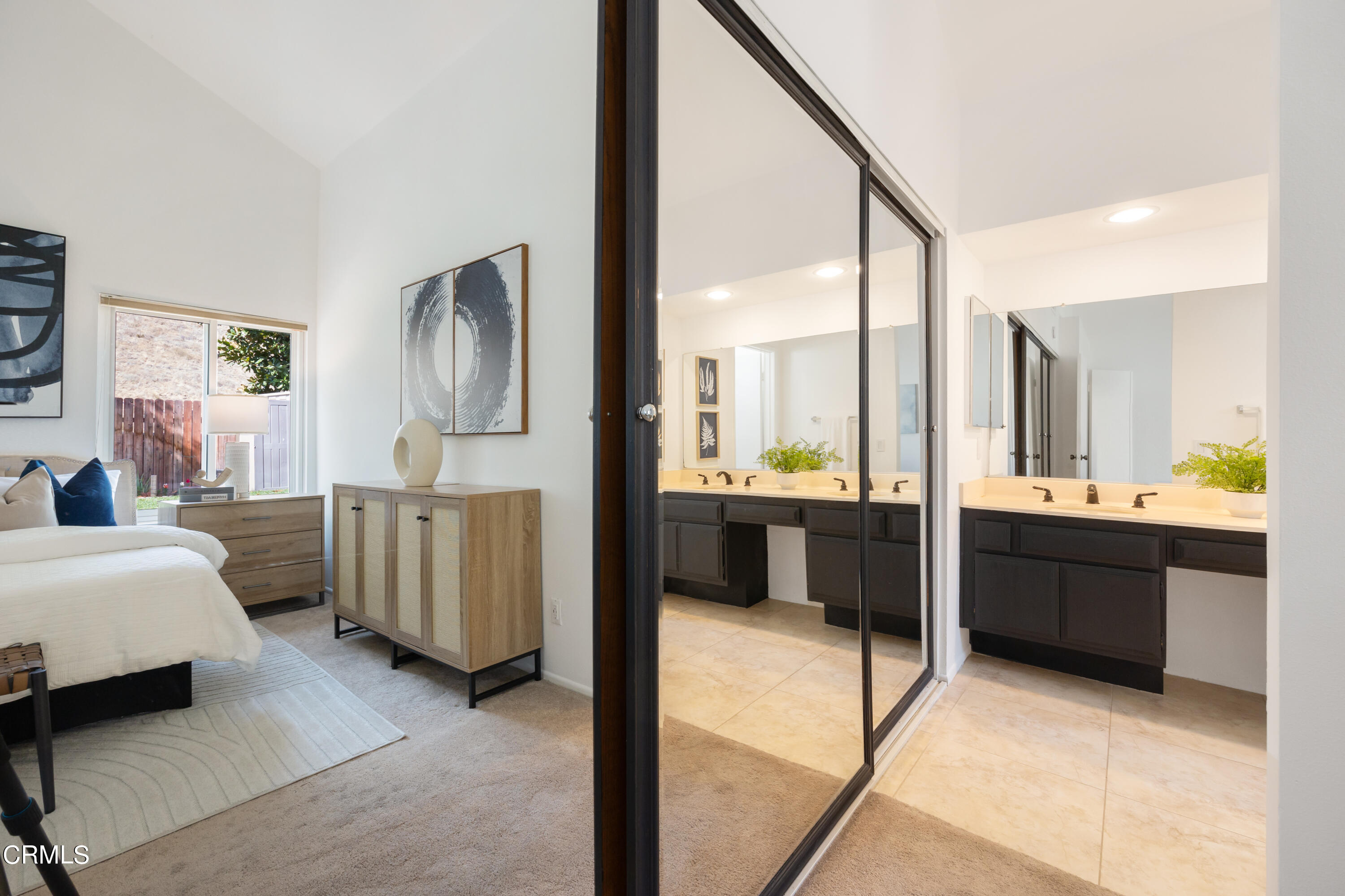 6464 Melray Street Moorpark, CA 93021 - Photo 39 of 57 a large bedroom with a large bed and a large window