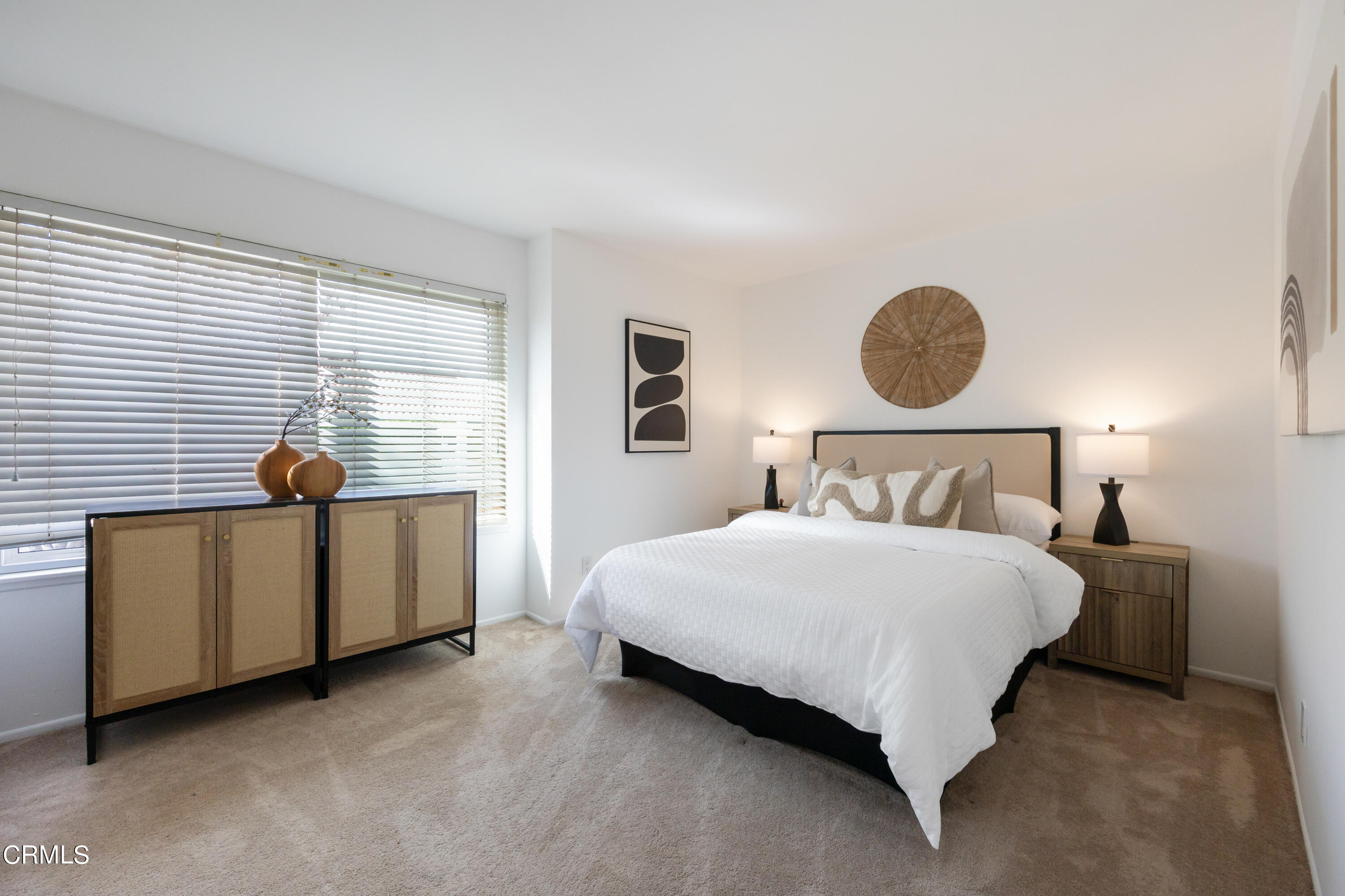 6464 Melray Street Moorpark, CA 93021 - Photo 49 of 57 a bedroom with a bed and a dresser next to a window