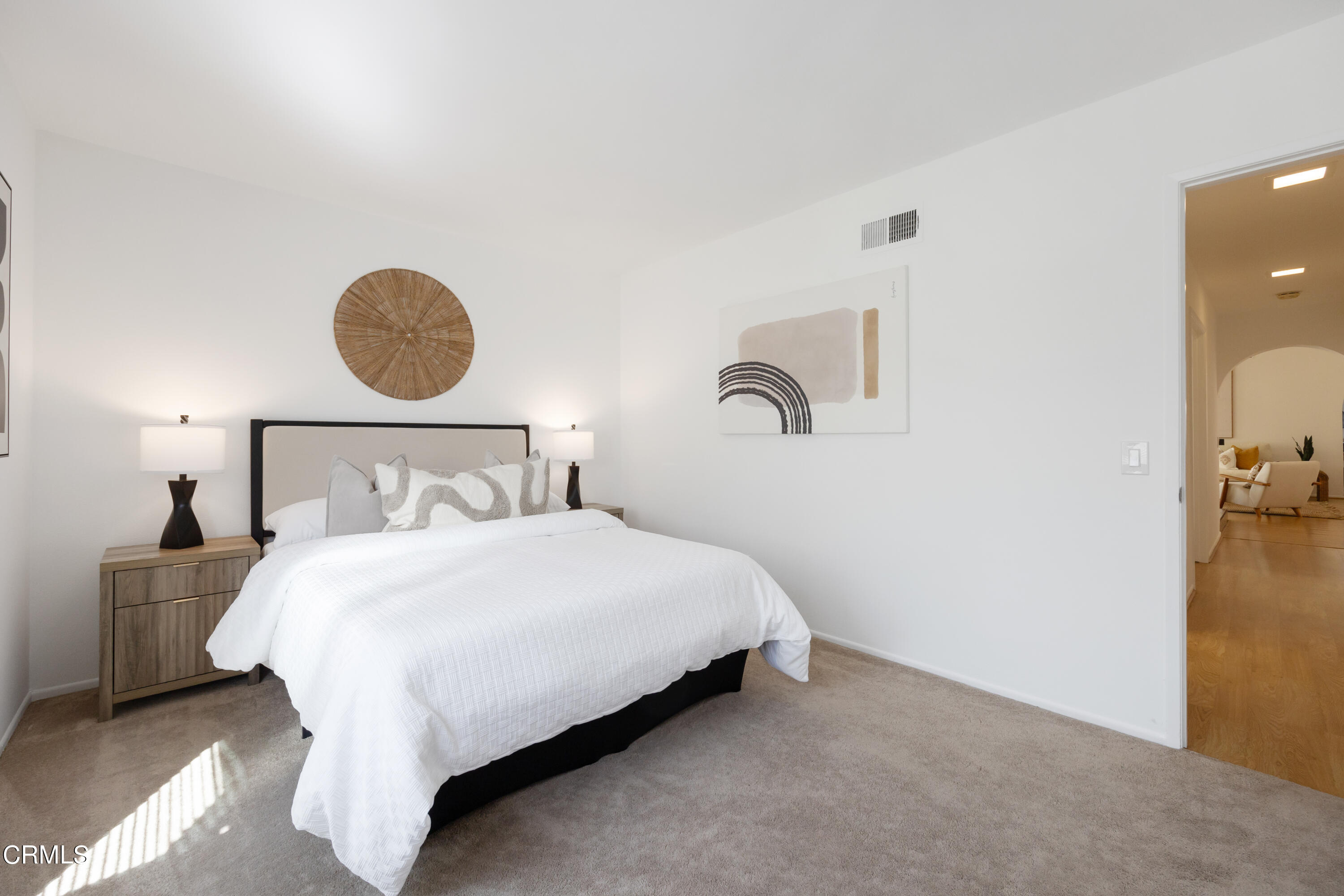 6464 Melray Street Moorpark, CA 93021 - Photo 50 of 57 a bedroom with a bed and flowerpot