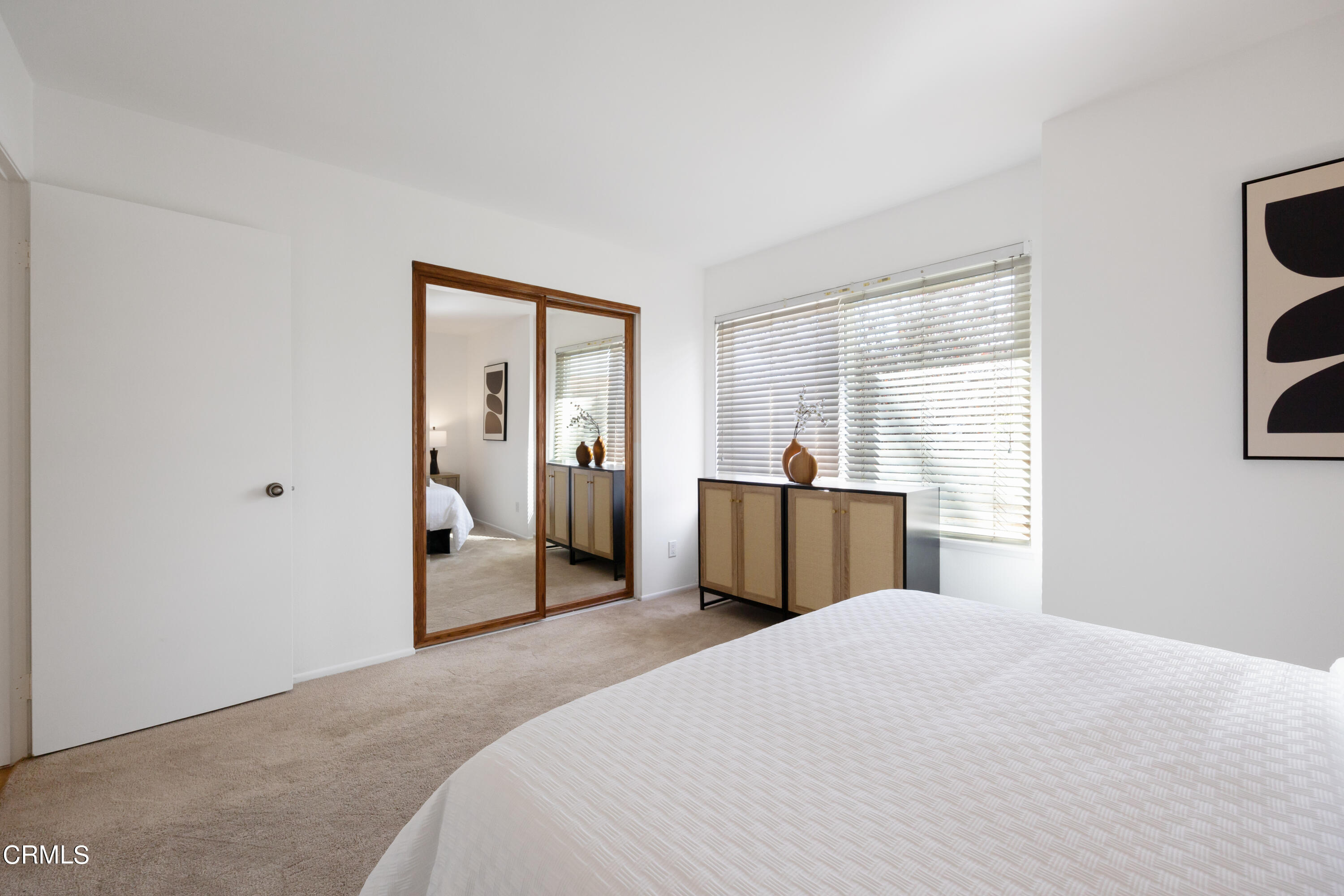 6464 Melray Street Moorpark, CA 93021 - Photo 52 of 57 a bedroom with a bed and a window