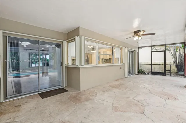a view of a kitchen with a sink and cabinet area