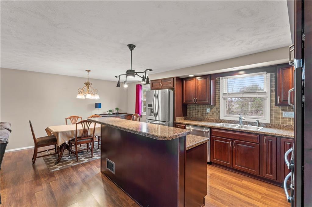191 Deer Drive Washington, PA 15301 - Photo 11 of 33 a kitchen with lots of counter top space and dining table