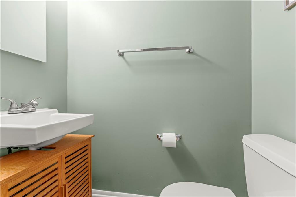 191 Deer Drive Washington, PA 15301 - Photo 15 of 33 a bathroom with a sink a mirror and a toilet