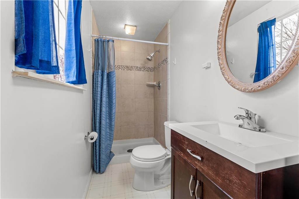 191 Deer Drive Washington, PA 15301 - Photo 19 of 33 a bathroom with a sink a toilet and a mirror