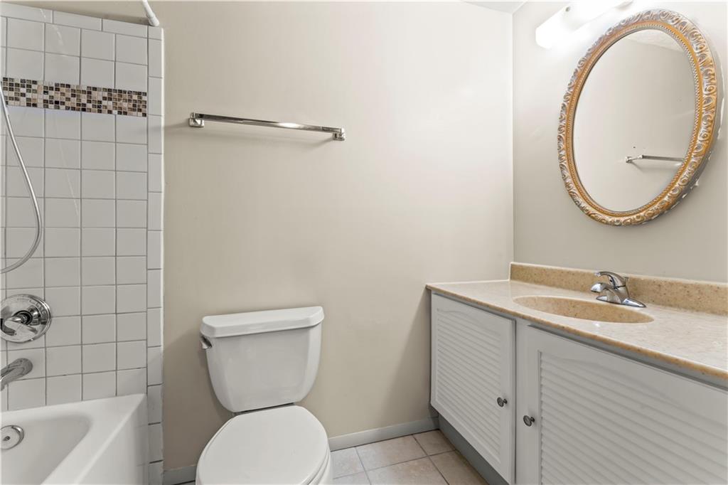 191 Deer Drive Washington, PA 15301 - Photo 24 of 33 a bathroom with a toilet a sink and mirror