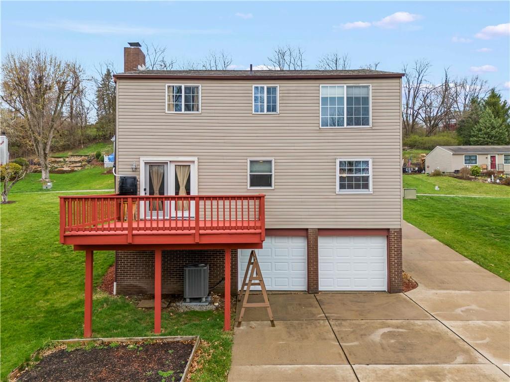 191 Deer Drive Washington, PA 15301 - Photo 28 of 33 a view of a house with a patio and a yard