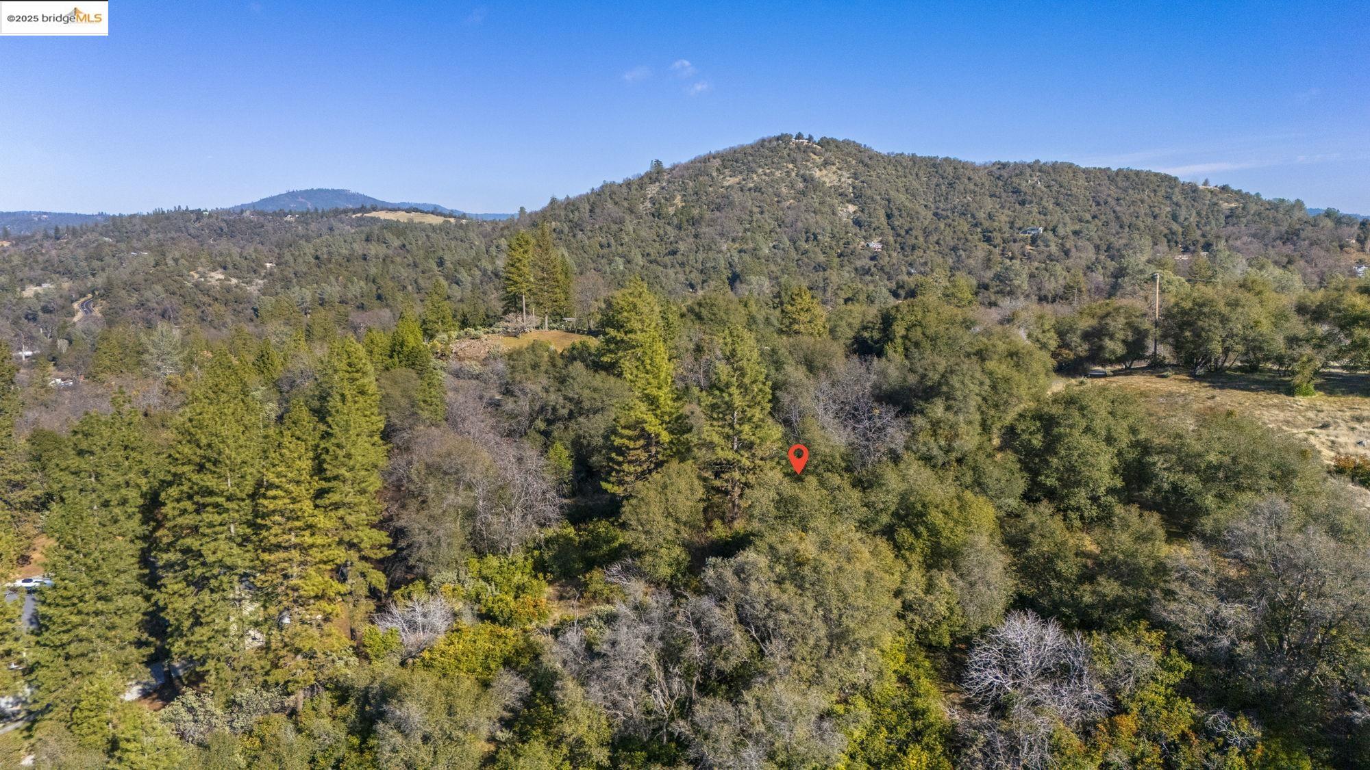 Par A Par A Robin Ridge Sonora, CA 95370 - Photo 7 of 14 a view of a large mountain with mountains in the background