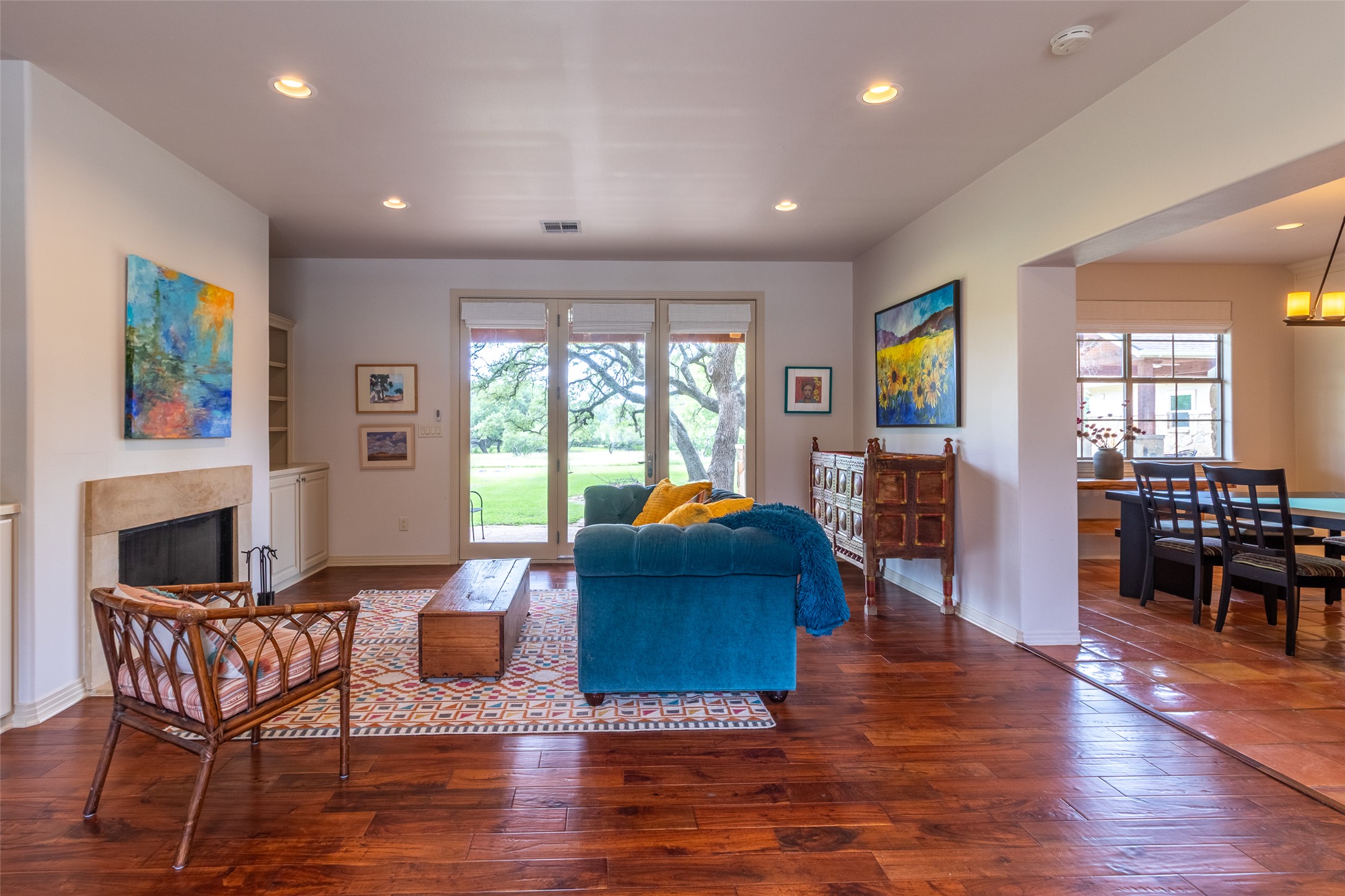 515 E Trail Spicewood, TX 78669 - Photo 14 of 36 a living room with furniture and a fireplace