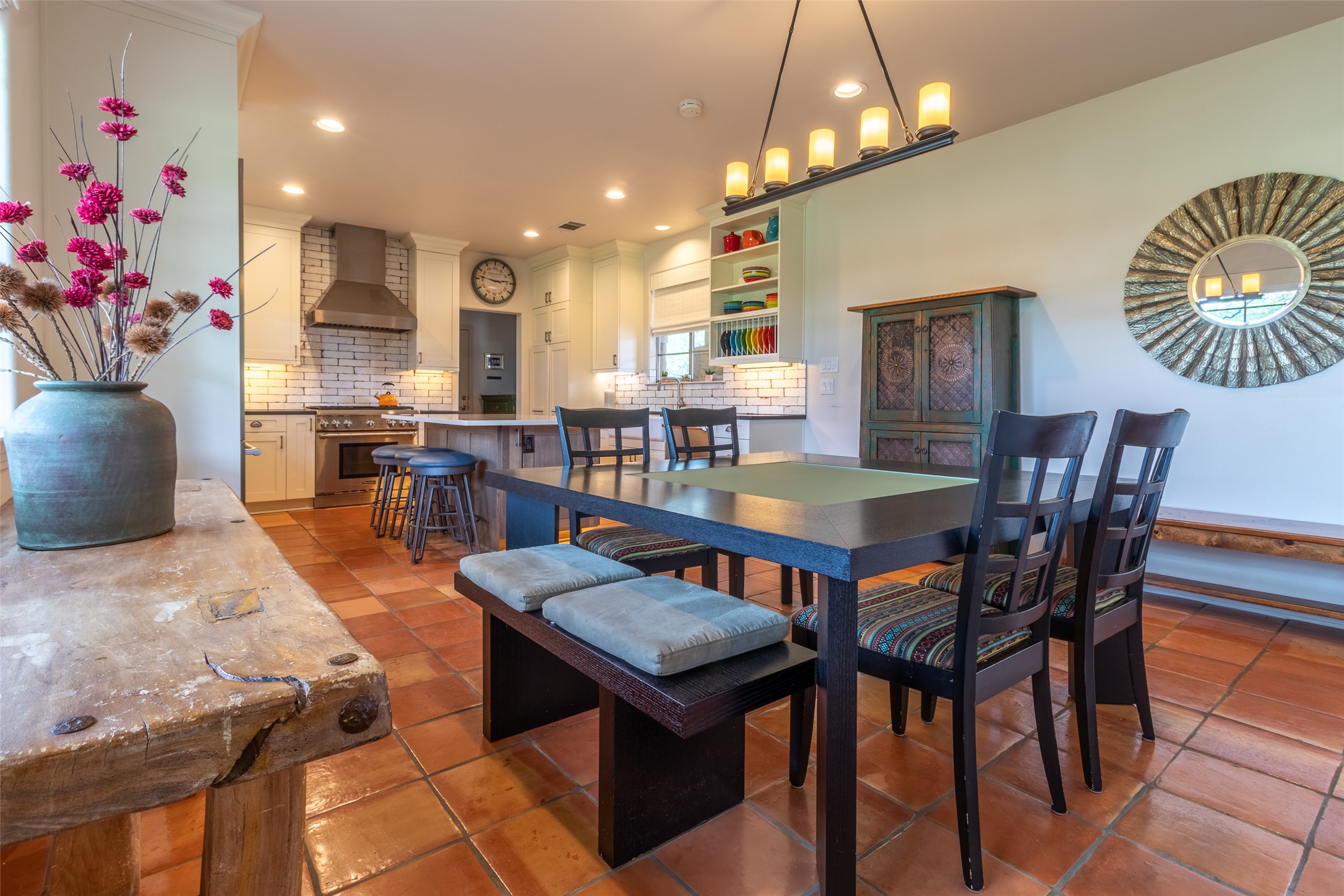 515 E Trail Spicewood, TX 78669 - Photo 23 of 36 a living room with furniture and a chandelier