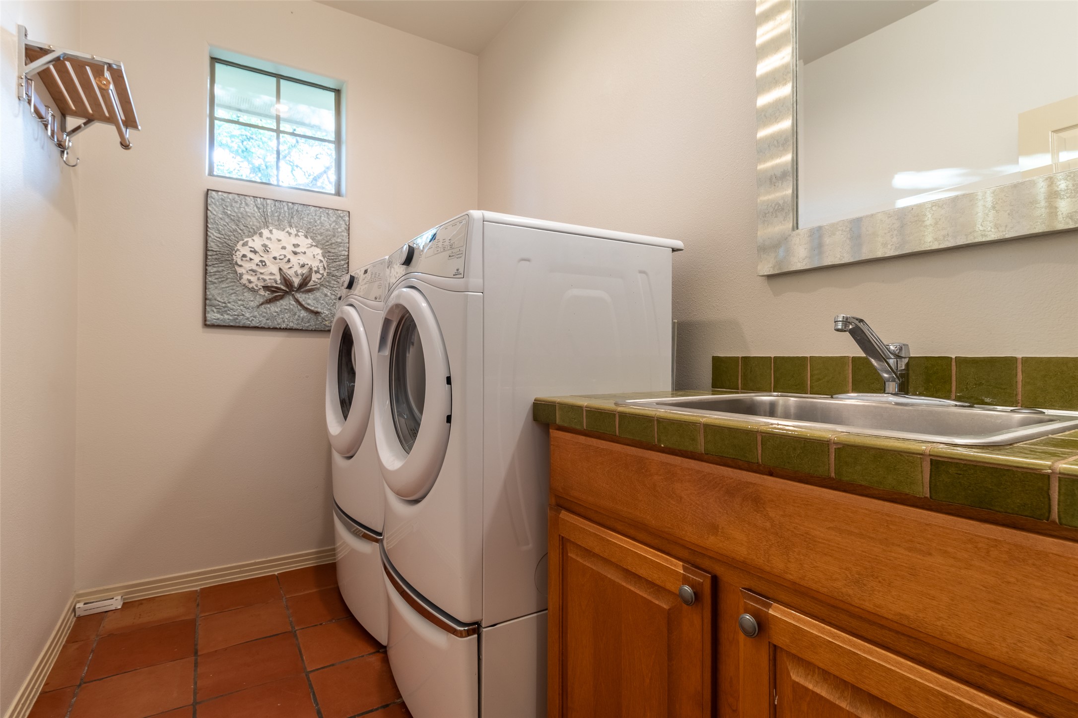 515 E Trail Spicewood, TX 78669 - Photo 28 of 36 a utility room with dryer and washer