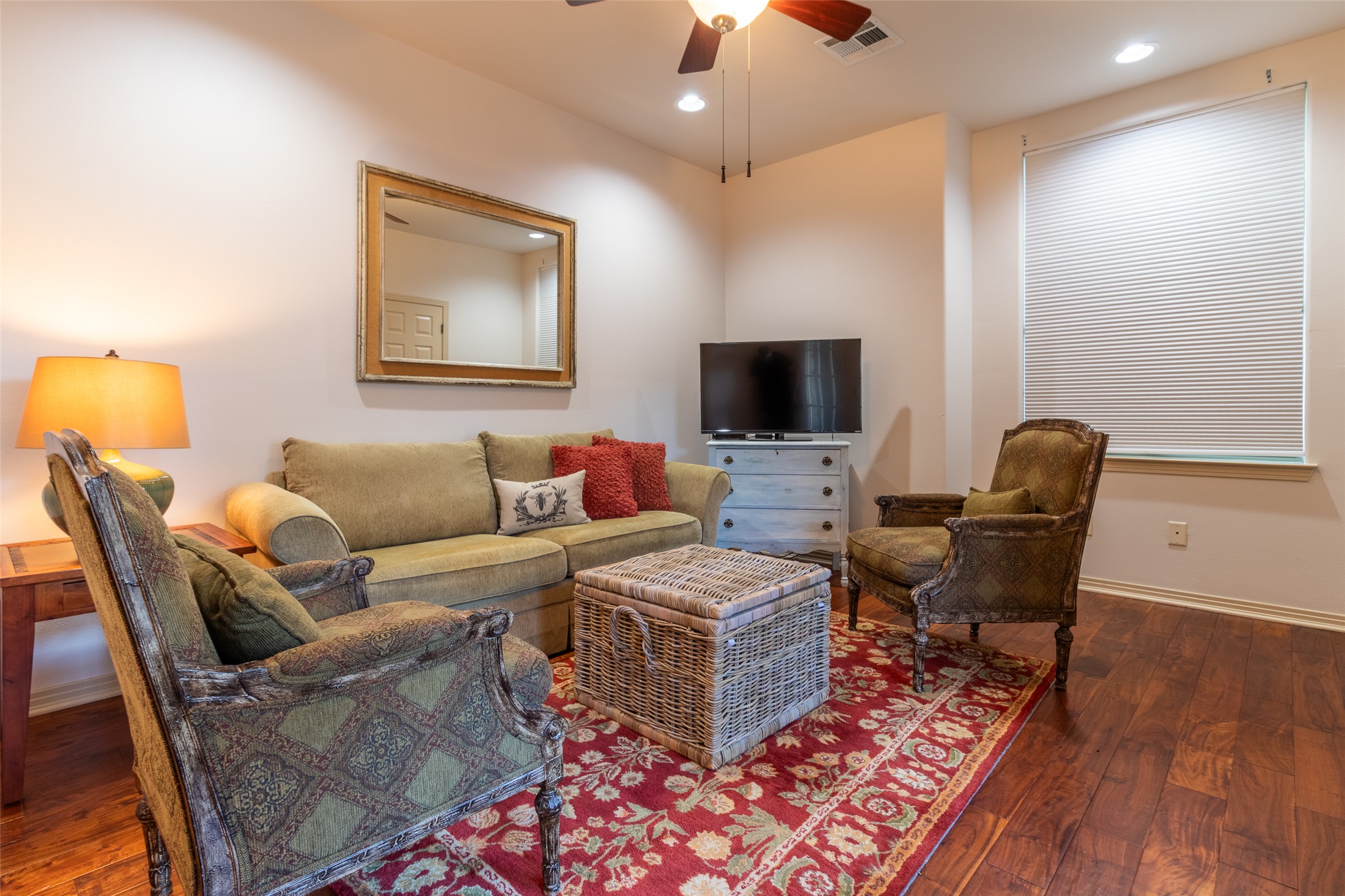 515 E Trail Spicewood, TX 78669 - Photo 33 of 36 a living room with furniture and a flat screen tv