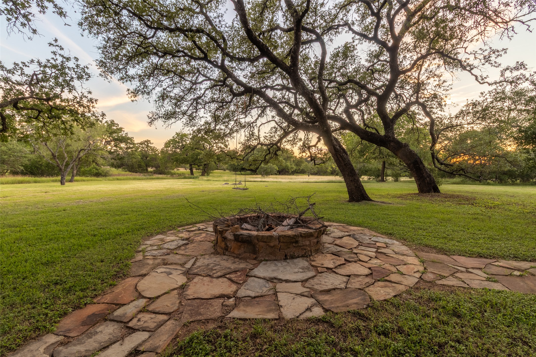515 E Trail Spicewood, TX 78669 - Photo 36 of 36 a view of a golf course with a trees