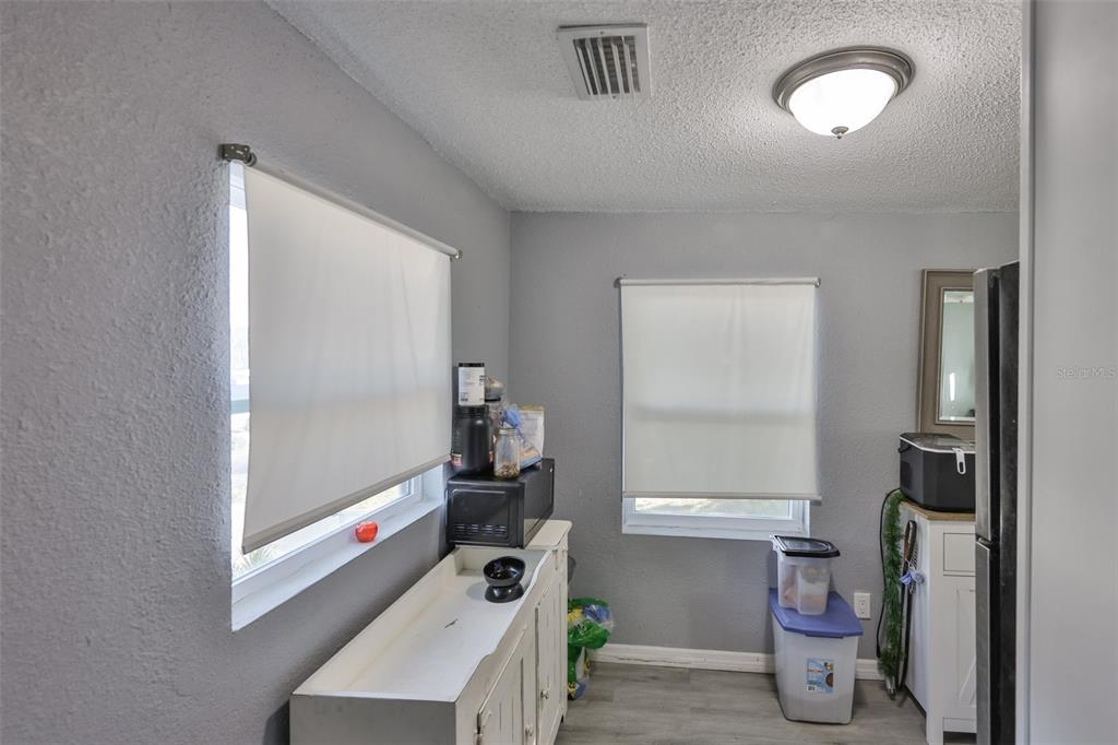 1208 17th Street North St. Petersburg, FL 33713 - Photo 4 of 15 a room with storage and utility