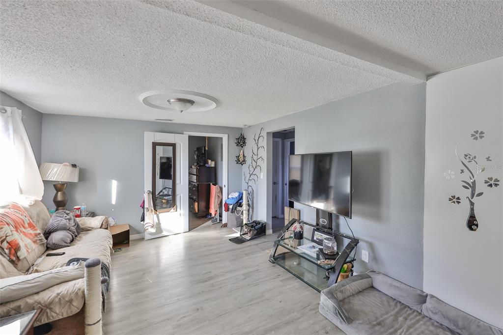 1208 17th Street North St. Petersburg, FL 33713 - Photo 5 of 15 a living room with furniture and wooden floor