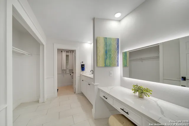 a sitting area with furniture and a table