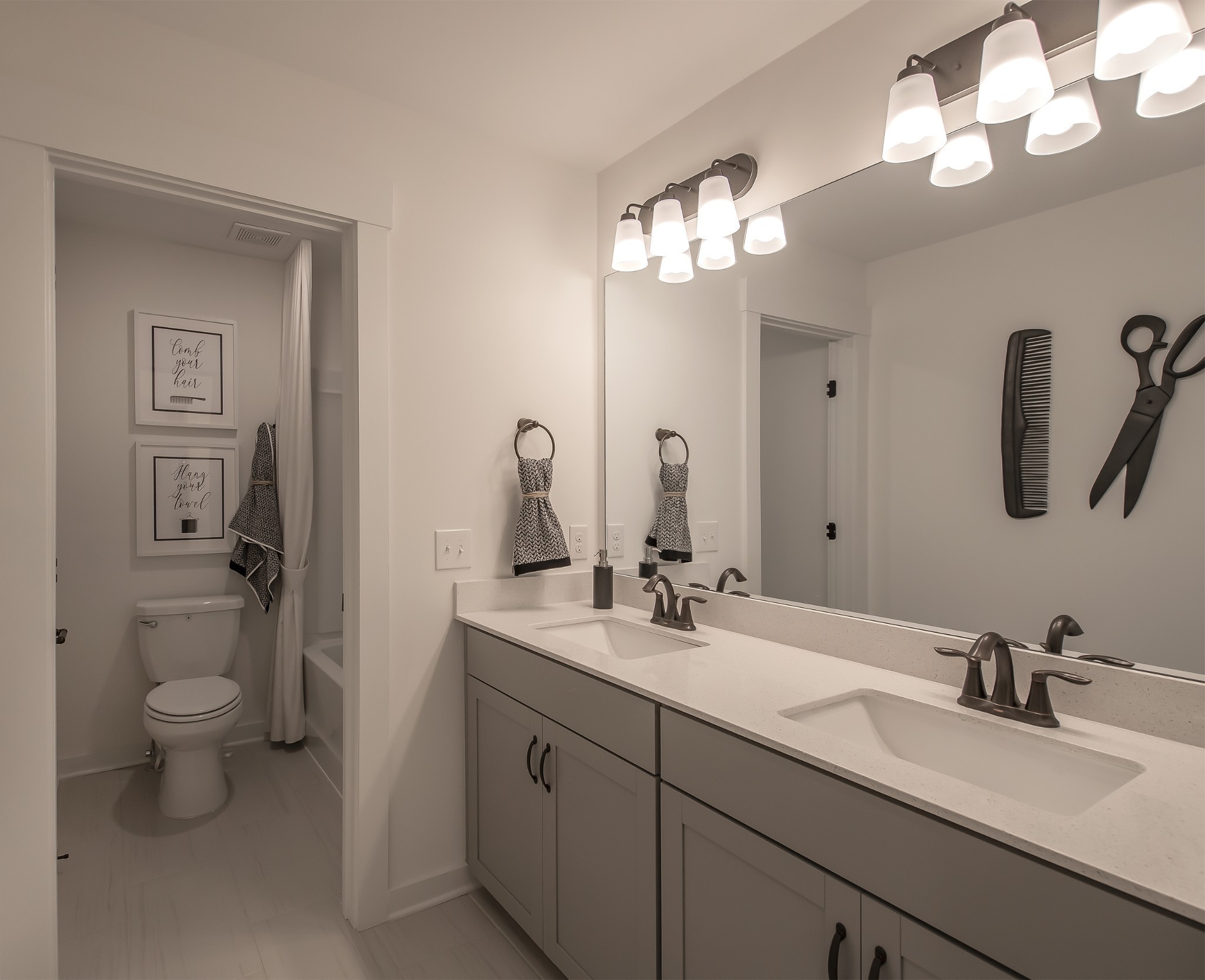 1133 Pebble Run Road Hendersonville, TN 37075 - Photo 21 of 43 a bathroom with a double vanity sink mirror and toilet