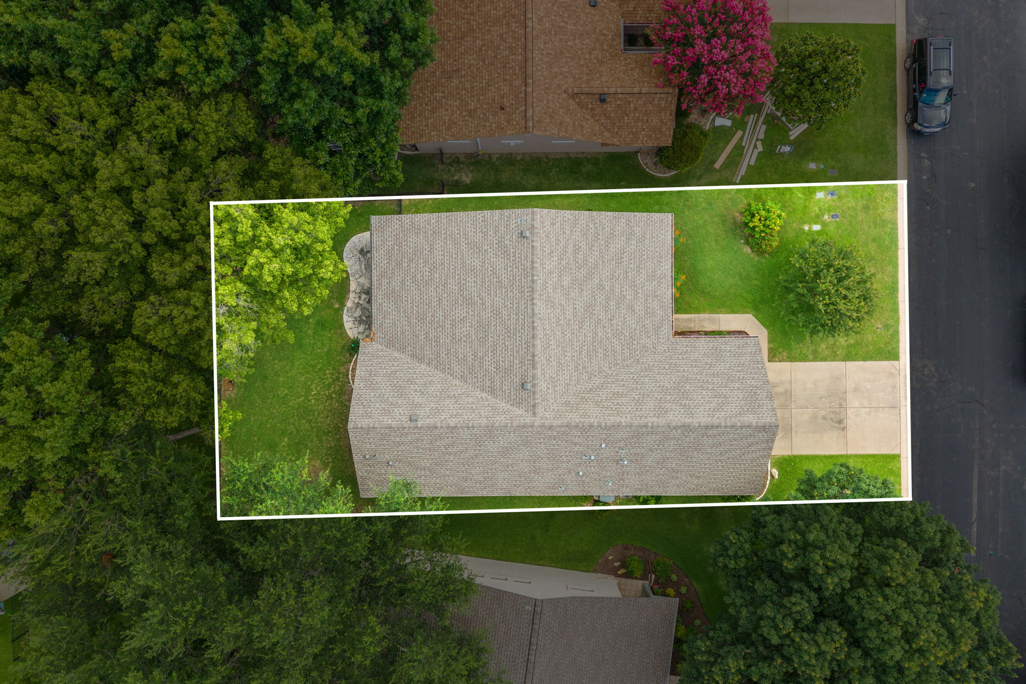 118 Bass Street Georgetown, TX 78633 - Photo 7 of 40 An aerial perspective showcases the home's roofline and generously sized yard, complete with a paved driveway.