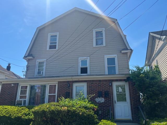 45 James Street Inwood, NY 11096 - Photo 3 of 11 a brick building with a large windows