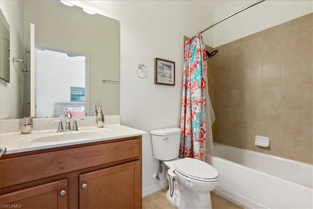 a view of a hallway with dining area and livingroom view