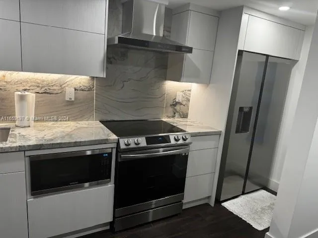 a bathroom with a toilet and a sink