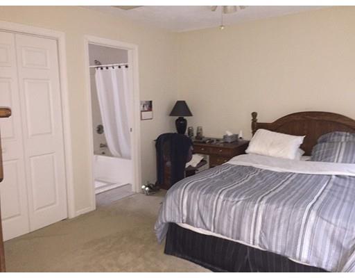 75 Ridge Road Raynham, MA 02767 - Photo 15 of 28 a bedroom with a bed and a closet