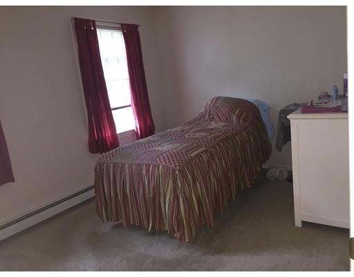 75 Ridge Road Raynham, MA 02767 - Photo 17 of 28 a bedroom with a bed and a window